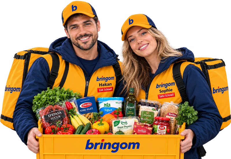 Die Bringom-Kuriere Hakan und Ayla; Hakan zeigt den Daumen nach oben, Ayla hält ein Handy.